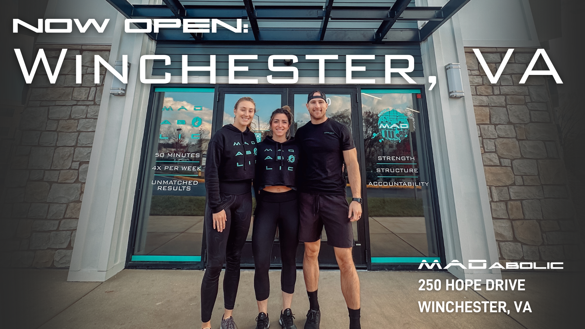 MADabolic Winchester team stands in front of the new gym opening December 9, 2024